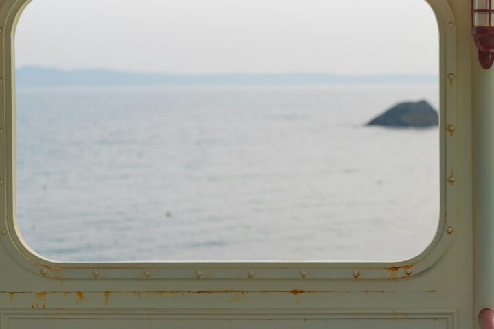 Sea view through a ship cabin window